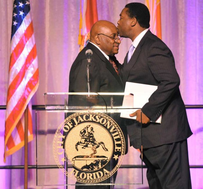 Bob.Self@jacksonville.com--4/20/12--Reverend H.T. Rhim from St. Joseph Missionary Baptist Church gets a kiss on the forehead from Jacksonville Mayor Alvin Brown after Rhim, a close family friend of Brown's, introduced the Mayor at Friday morning's breakfast.  Friday morning was the Inaugural Mayor Brown Interfaith Celebration breakfast held in the Prime F. Osborn III convention center.  (The Florida Times-Union, Bob Self)